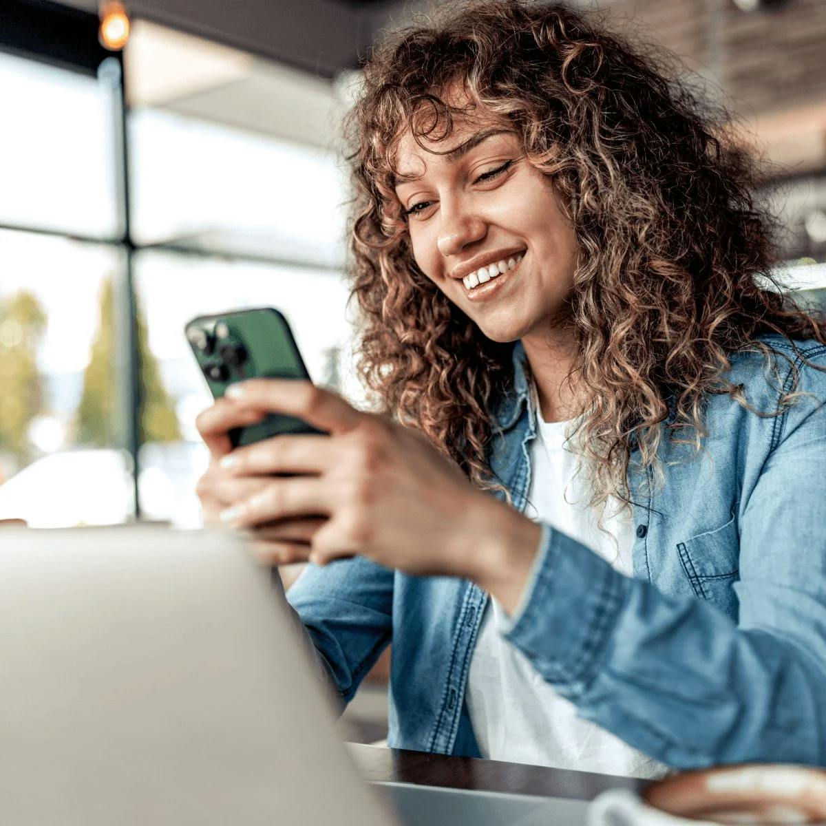 Woman on her phone.